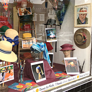 T Snook, hat shop of Bridport, 'Hats in Art' window display for Dorset Art Weeks