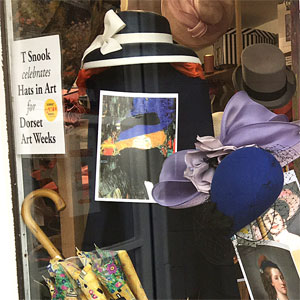 T Snook, hat shop of Bridport, 'Hats in Art' window display for Dorset Art Weeks