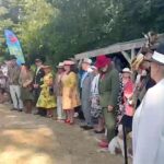 Still from Couple's 'Elegant Ensemble' competition sponsored by T Snook, hat shop in Dorset UK, as part of Bridport Hat Festival 2023