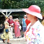 Shot from ladies 'Elegant Ensemble' competition sponsored by T Snook, hat shop in Dorset UK, as part of Bridport Hat Festival 2023