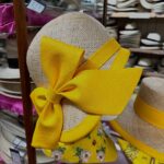 Ladies straw cloche hat at T Snook, hat shop in Bridport, Dorset, England