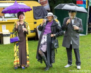 Elegant Ensemble competition of Bridport Hat Festival 2024 - couple winners with Sue of Snooks