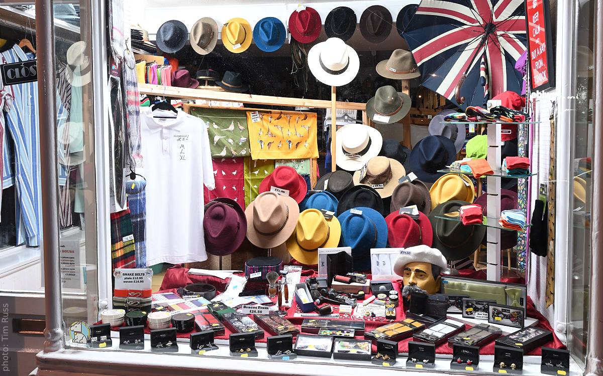 Autumn 2024 window display at T Snook, hat shop in Bridport, Dorset, England