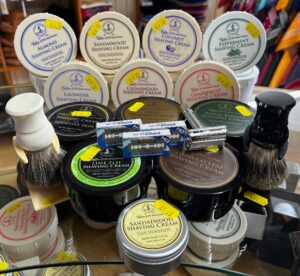 Shaving cream and accessories at T Snook, hat shop in Bridport, Dorset, England