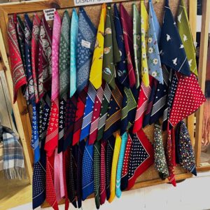 Single handkerchiefs display board at T Snook, hat shop in Bridport, Dorset, England