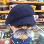 Peaked unisex beret at T Snook, hatters of Bridport