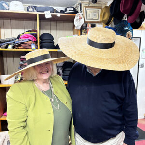 Huge-brim sunhats at T Snook, hatters of Bridport, Dorset, UK