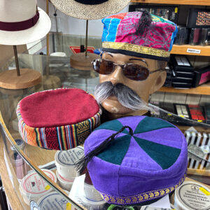 Smoking / lounging caps at T Snook, hatters of Bridport, Dorset, UK
