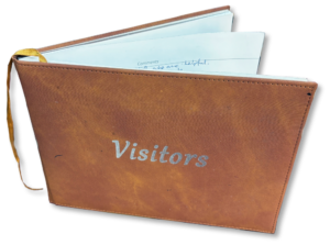 Visitors book at T Snook, hatters of Bridport, Dorset, UK